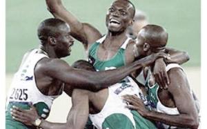 Nigeria's victorious quartet - Bada, Chukwu and Monye mobbing Enefiok after this great anchor leg run!