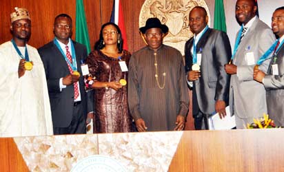 On July 24th 2013, President Goodluck honoured the 6 men who won the GOLD for Nigeria, awarding each of them N5 million - Sunbo, Sunday Bada's wife, stood in for him (L-R Fidelis Gadzama, Jude Monye, Sunbo Bada, President Goodluck Jonathan, Enefiok Udo-Obong, Nduka Awazie)